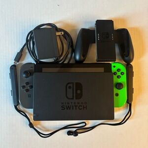 Nintendo Switch Console with Neon Green and Gray Joy-Con